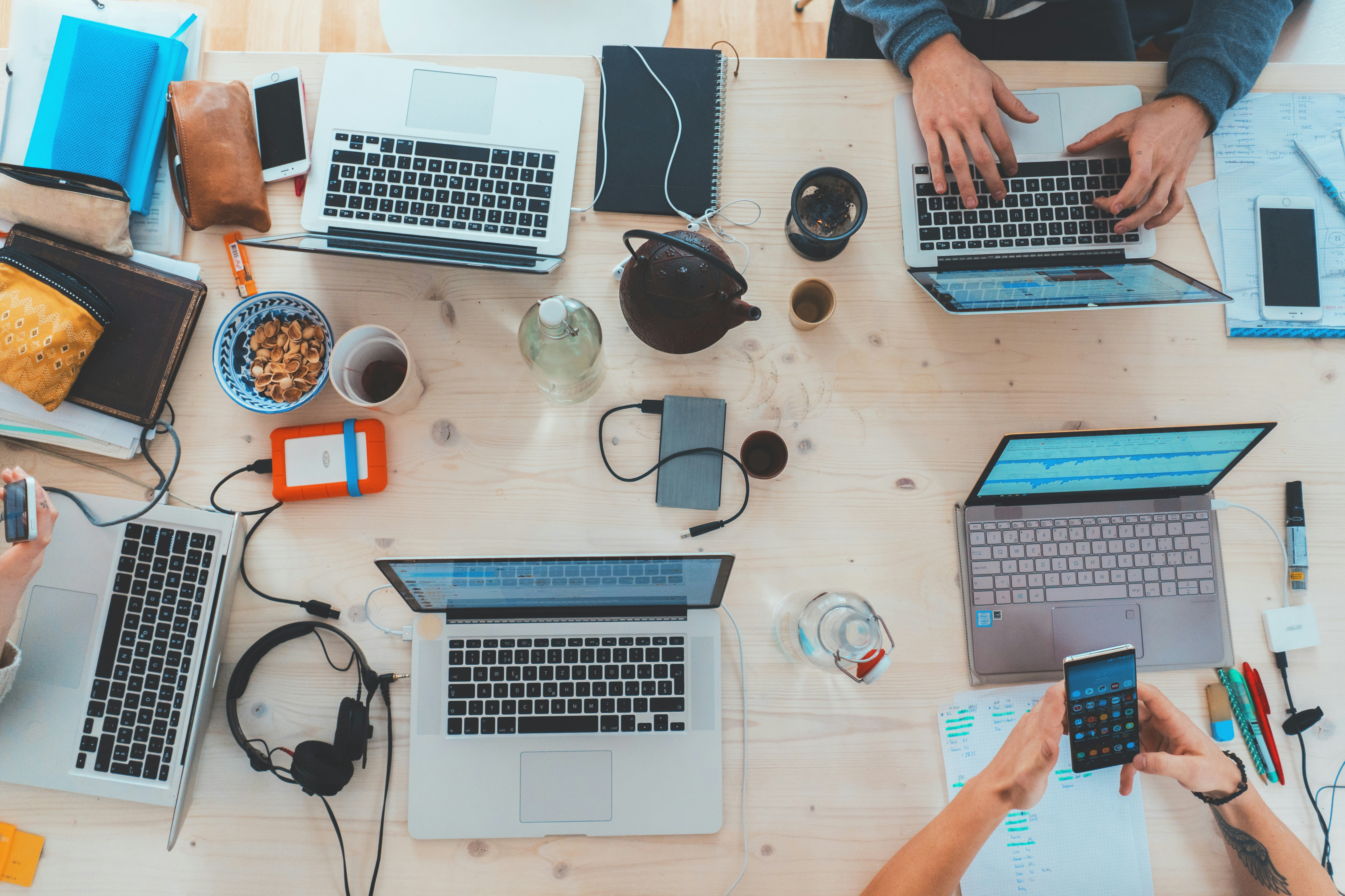 The Vantern Tech team collaborating around a shared workspace